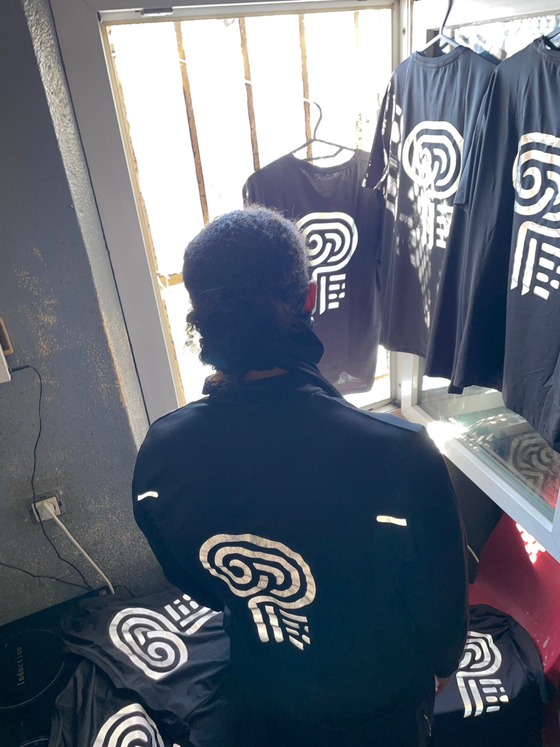 Original Polocom Plus archive photograph showing the back emblem and reflective shoulder details.
