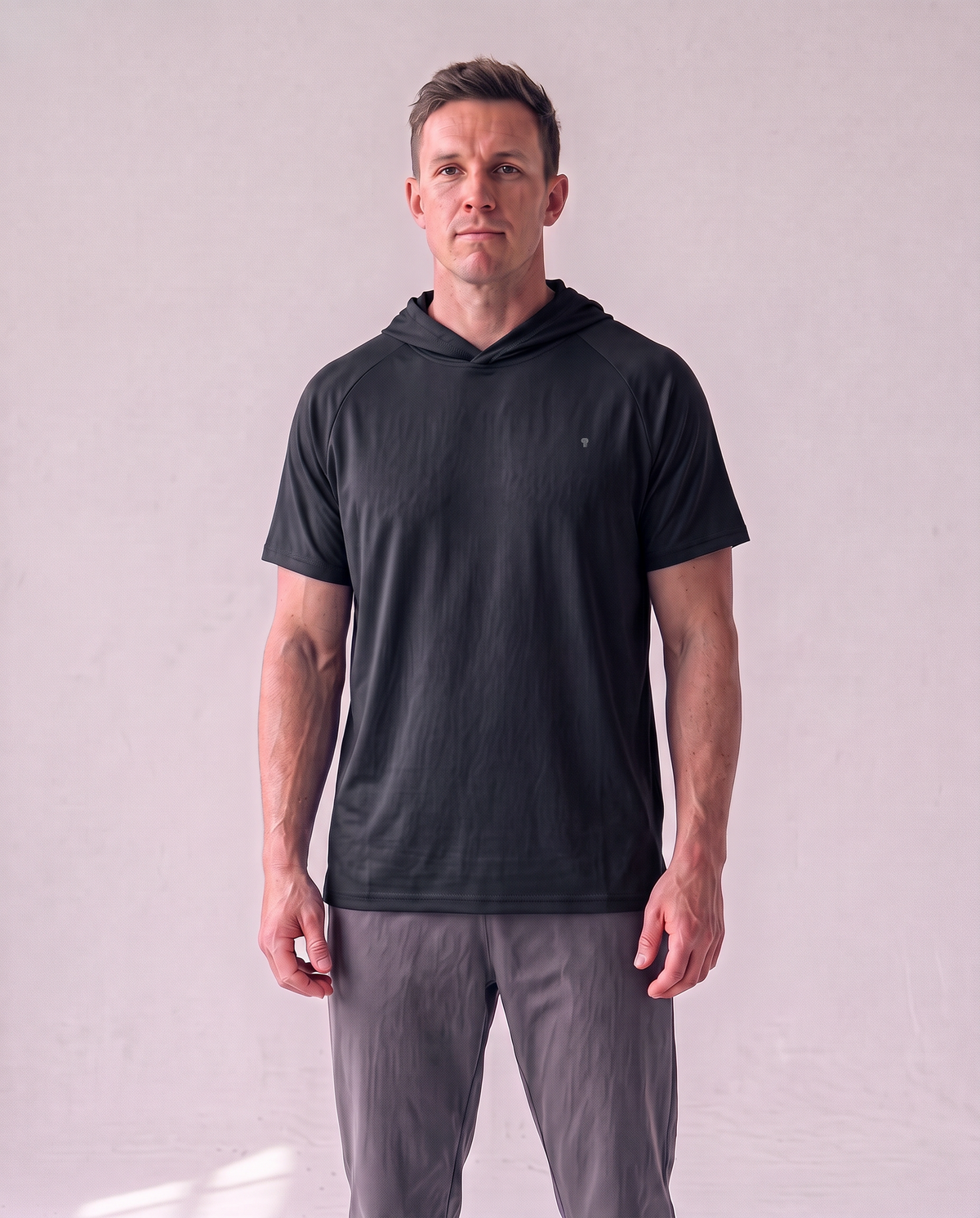 Polocom Plus Pace Short-Sleeve Hooded Tee - Black - worn front with small silver emblem [9028]