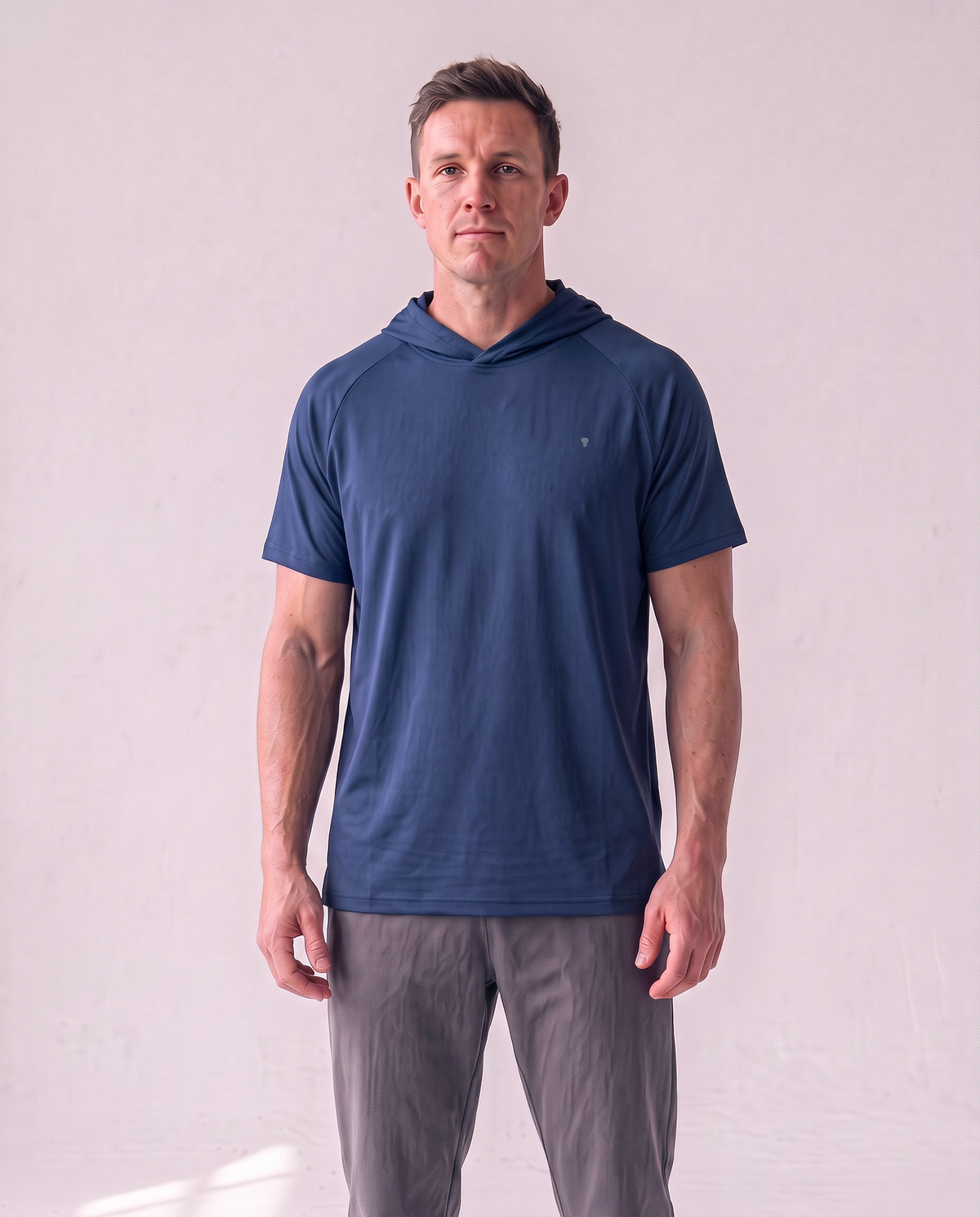 Polocom Plus Pace Short-Sleeve Hooded Tee - Navy - worn front with small silver emblem [9027]