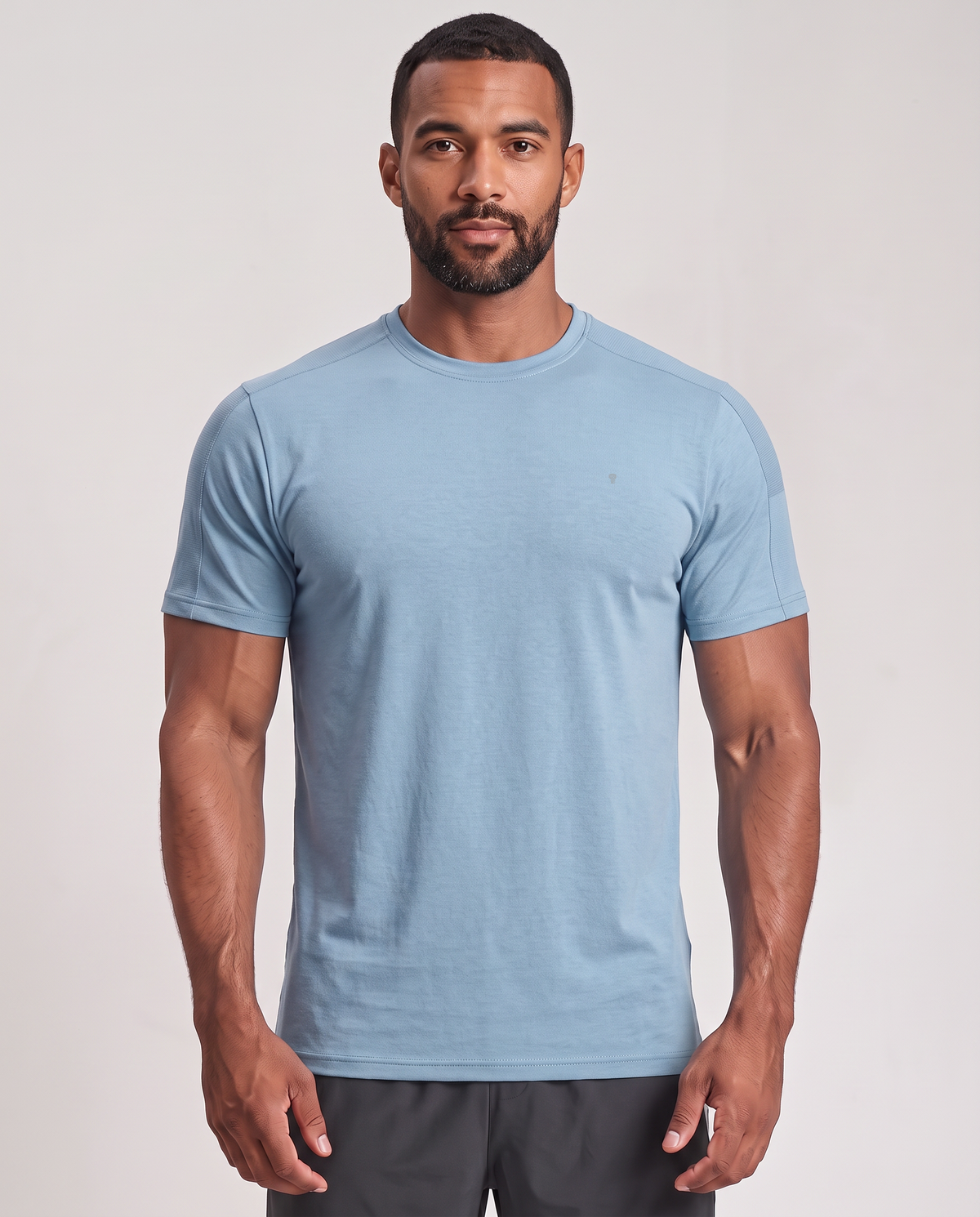 Polocom Plus Stow Sleeve-Pocket Tee - Blue - worn front with small silver emblem [9045]