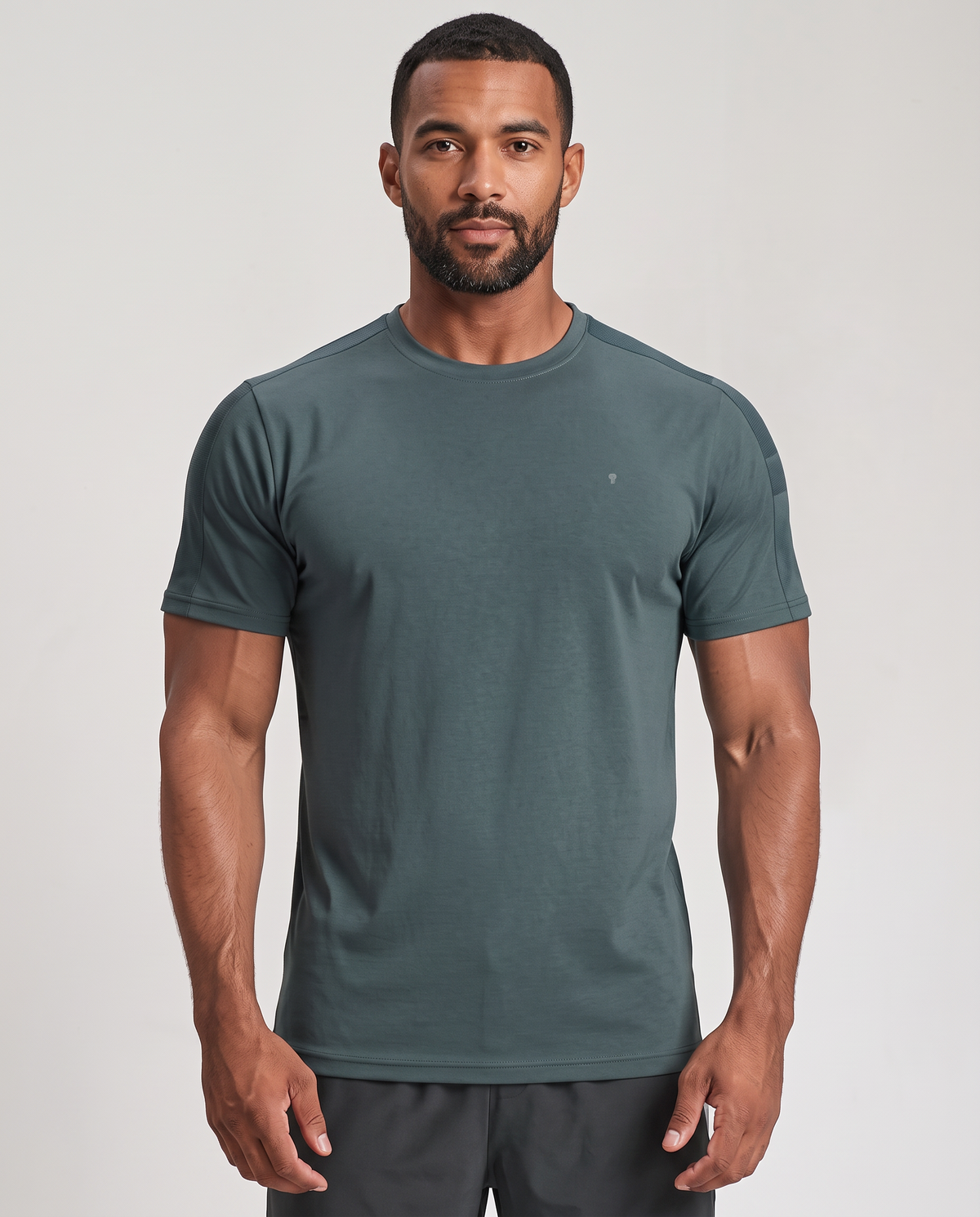 Polocom Plus Stow Sleeve-Pocket Tee - Green - worn front with small silver emblem [9044]