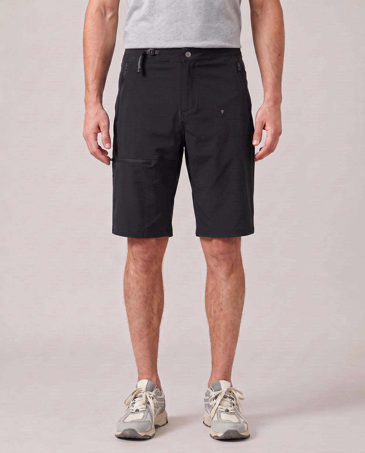 Polocom Plus Court Flat-Waist Shorts - Black - worn front with small silver emblem [9008]