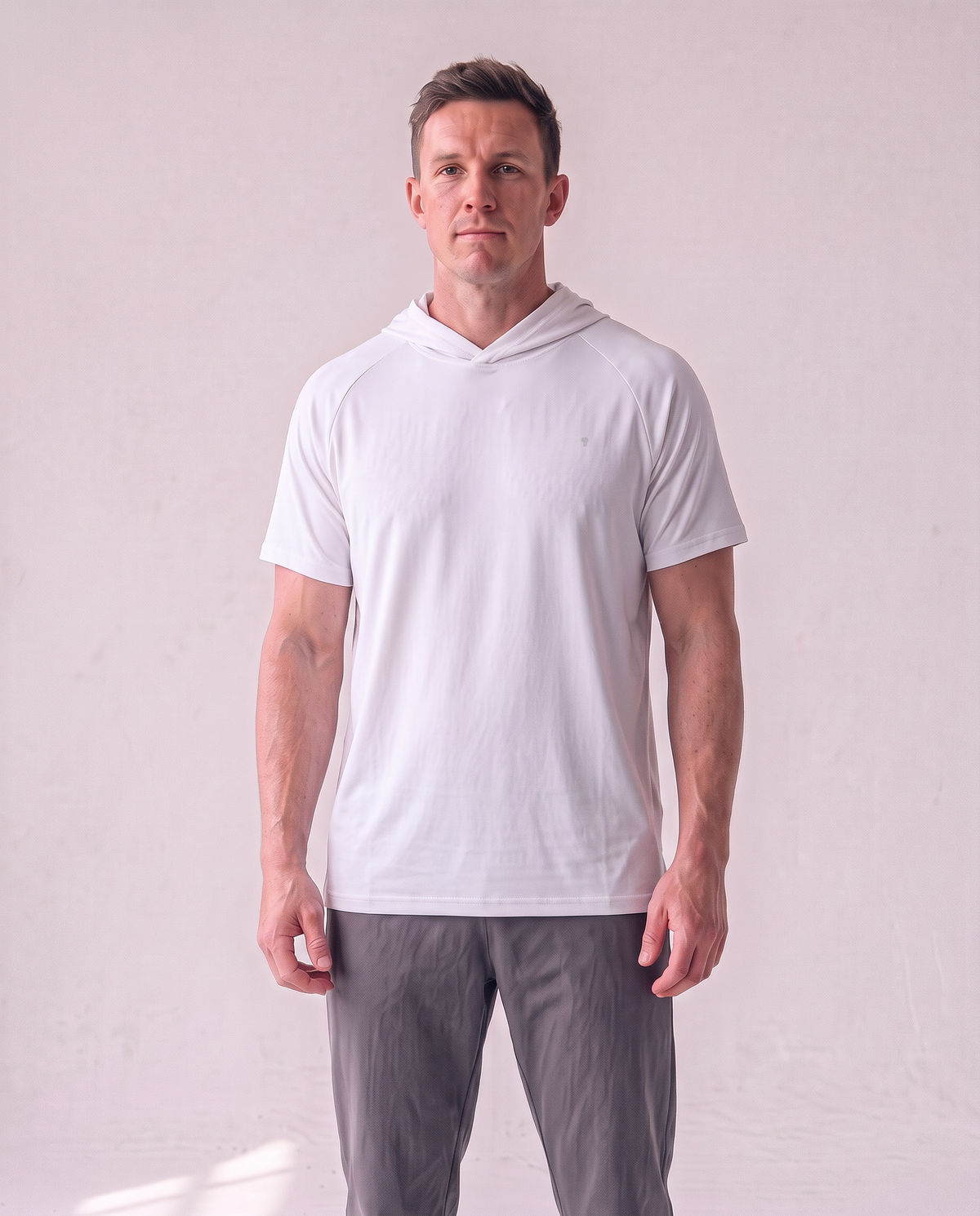 Polocom Plus Pace Short-Sleeve Hooded Tee - White - worn front with small silver emblem [9025]