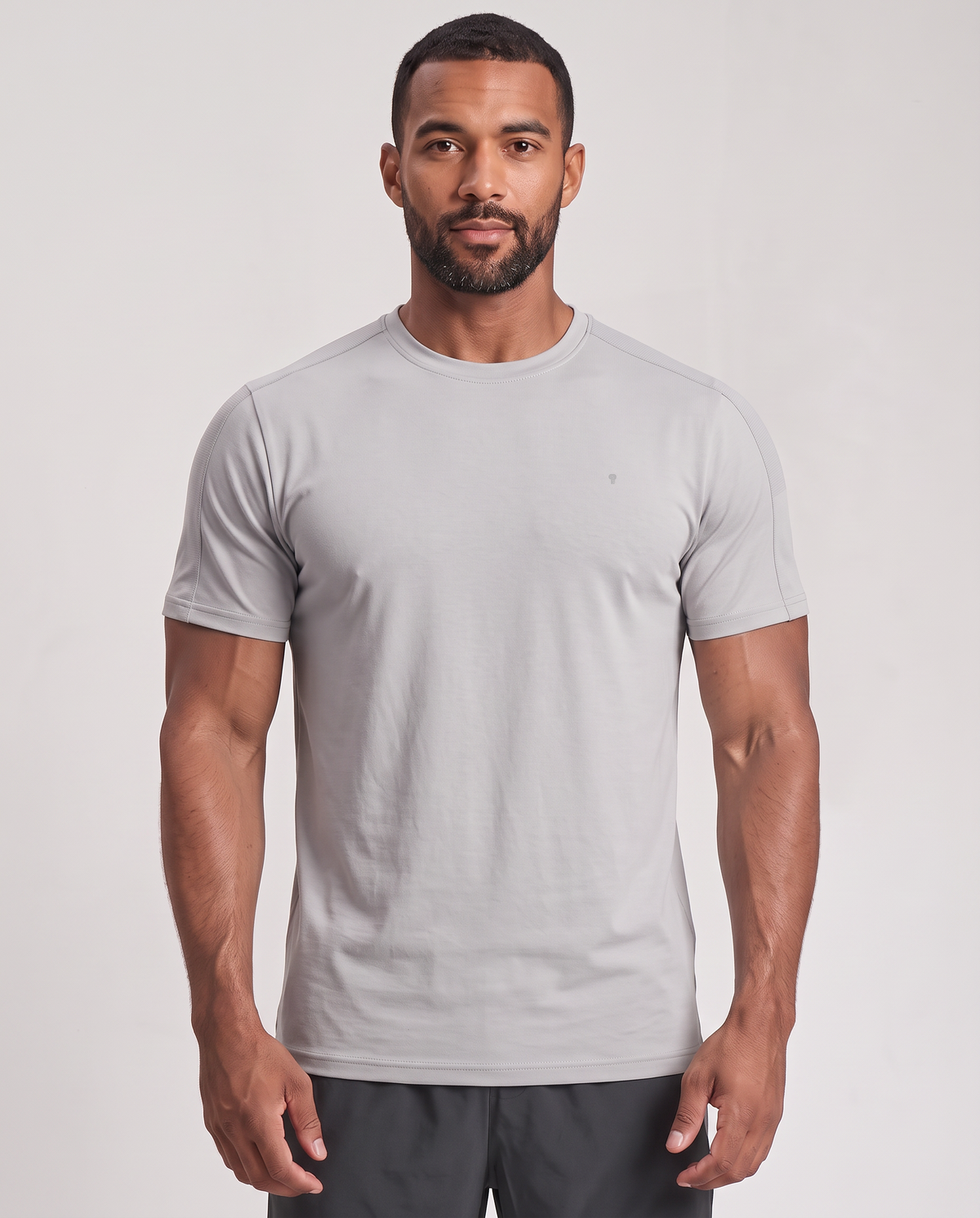 Polocom Plus Stow Sleeve-Pocket Tee - light gray - worn front with small silver emblem [9043]