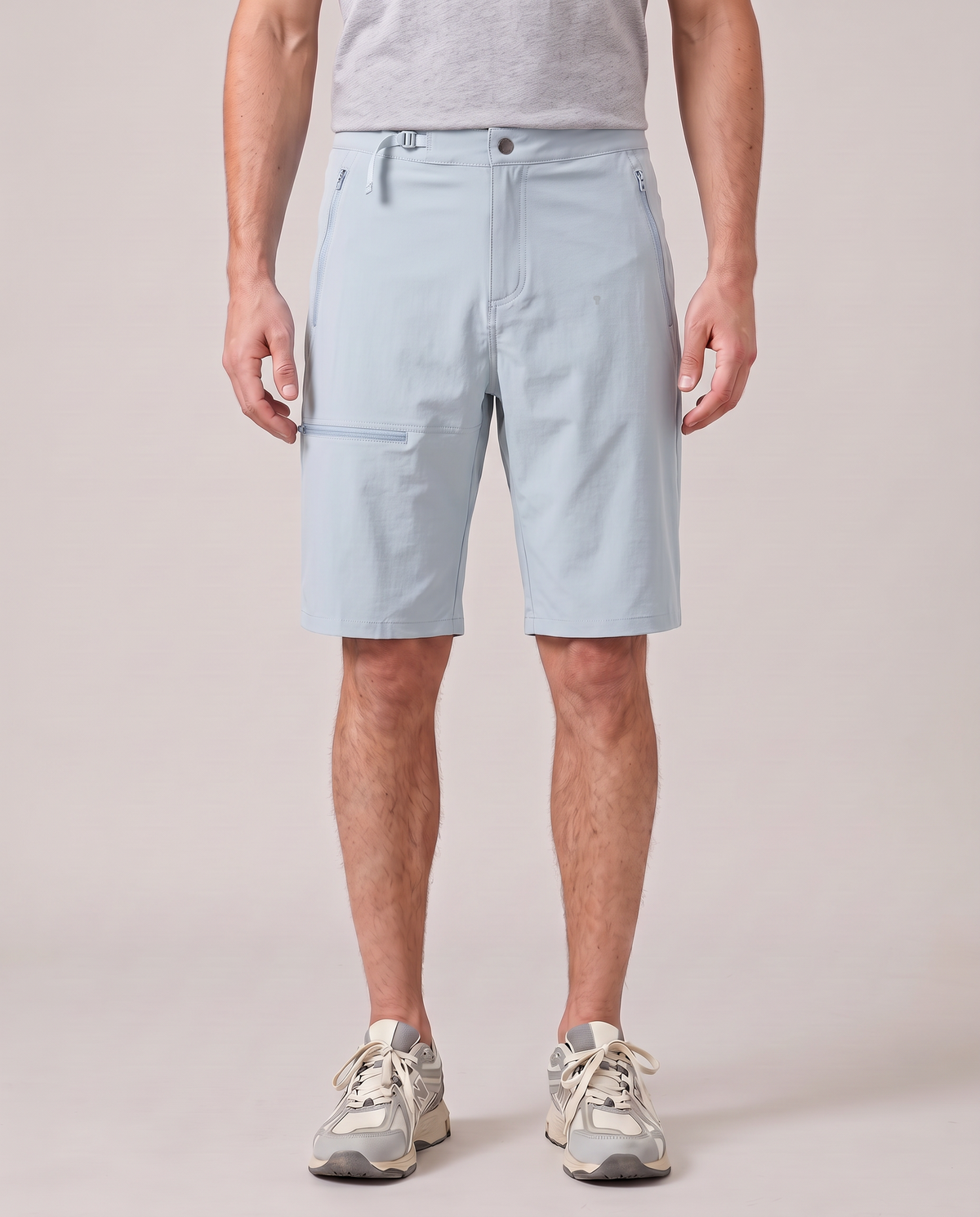 Polocom Plus Court Flat-Waist Shorts - Blue - worn front with small silver emblem [9010]