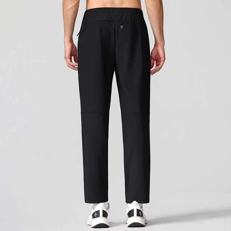 Polocom Plus Align Winter Training Pants in Black, back view on male model