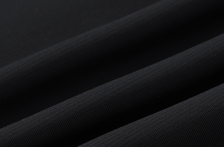 Polocom Plus Align Winter Training Pants in Black, close-up fabric texture