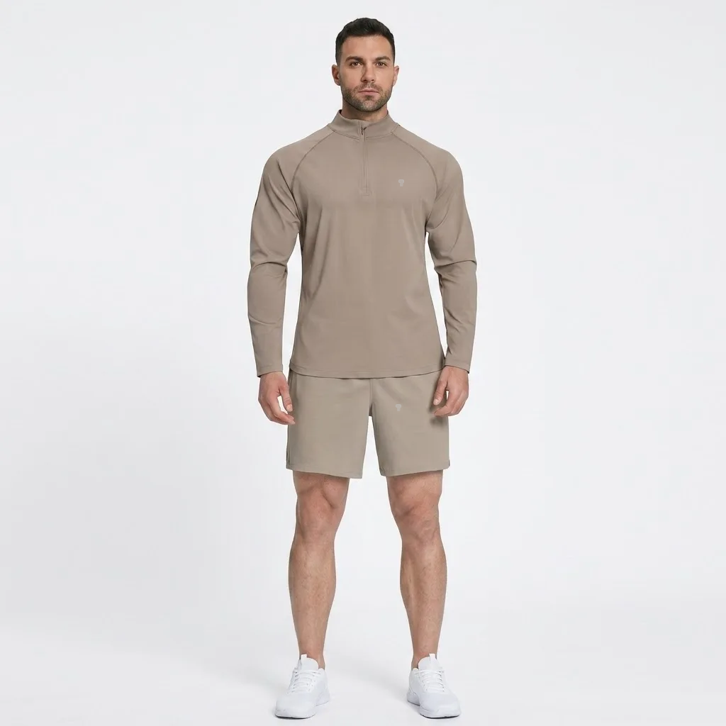 Polocom Plus Court Quarter-Zip & Shorts Set in Flaxen, front view on an adult male model