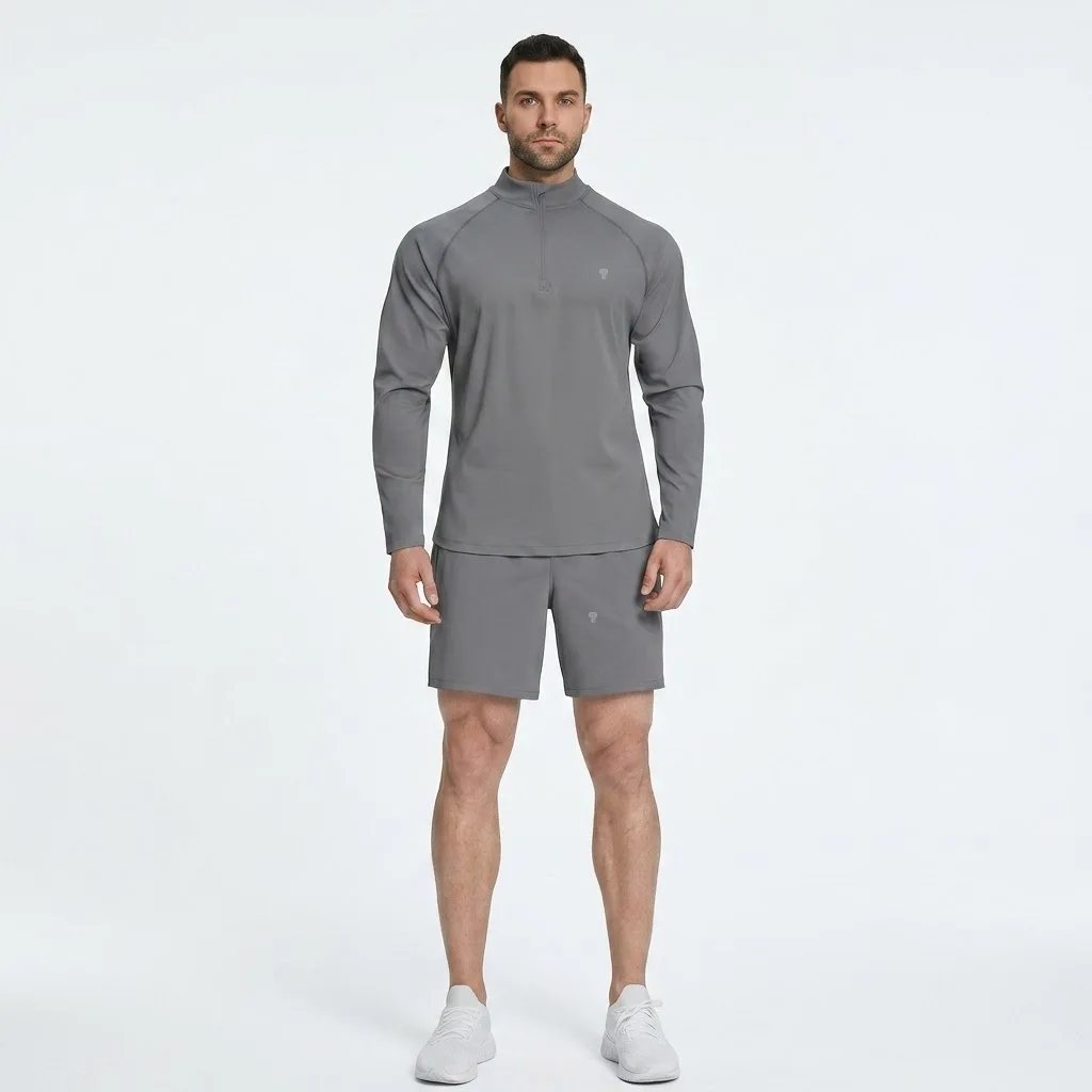 Polocom Plus Court Quarter-Zip & Shorts Set in Gray, front view on an adult male model