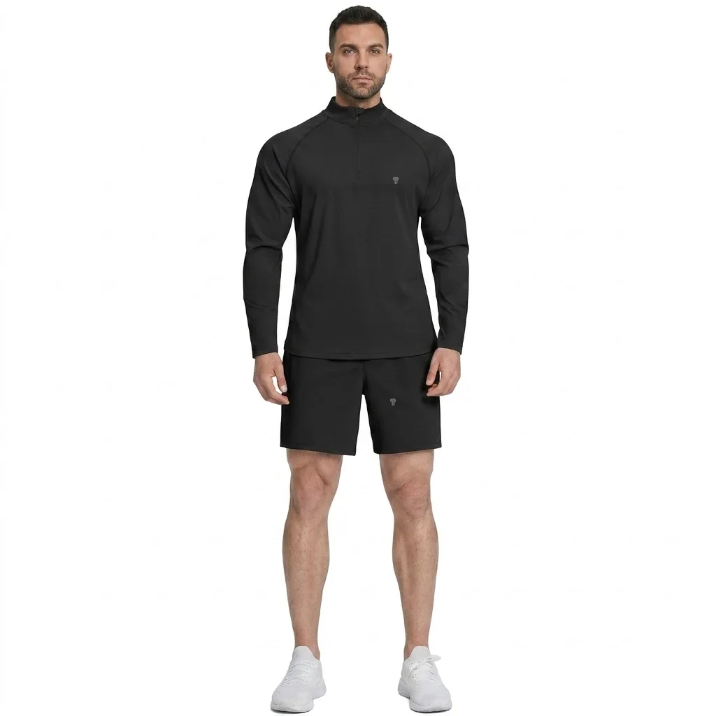 Polocom Plus Court Quarter-Zip & Shorts Set in Black, front view on an adult male model
