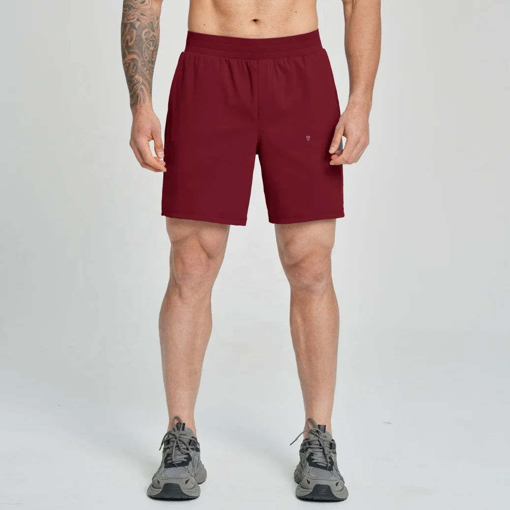 Polocom Plus Court Stretch Shorts in Red, full-length front view worn by an adult male model