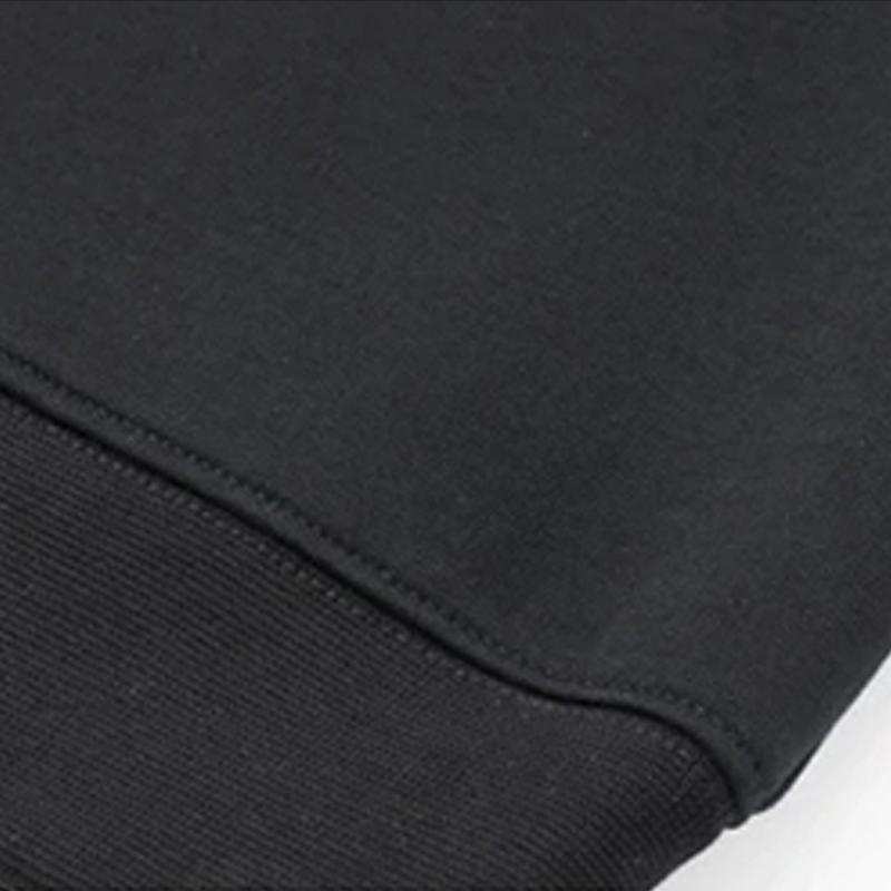 Ease Heavyweight Stretch Crewneck in Black, ribbed hem construction detail