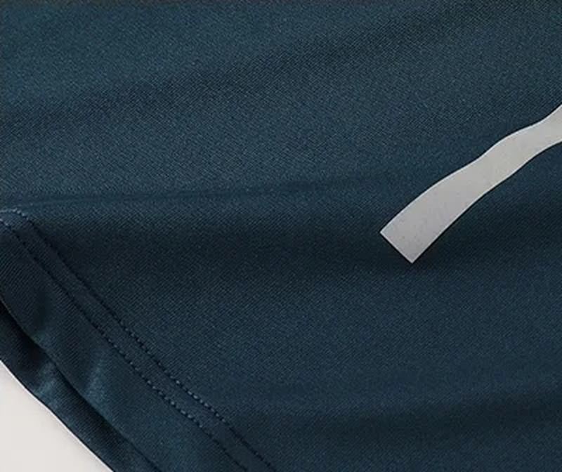 Glide Stripe Long Sleeve Tee stripe and hem construction detail