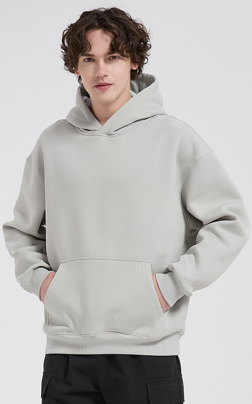 Polocom Plus Haven Fleece Pullover Hoodie in Light Rusty Gray, front view on male model