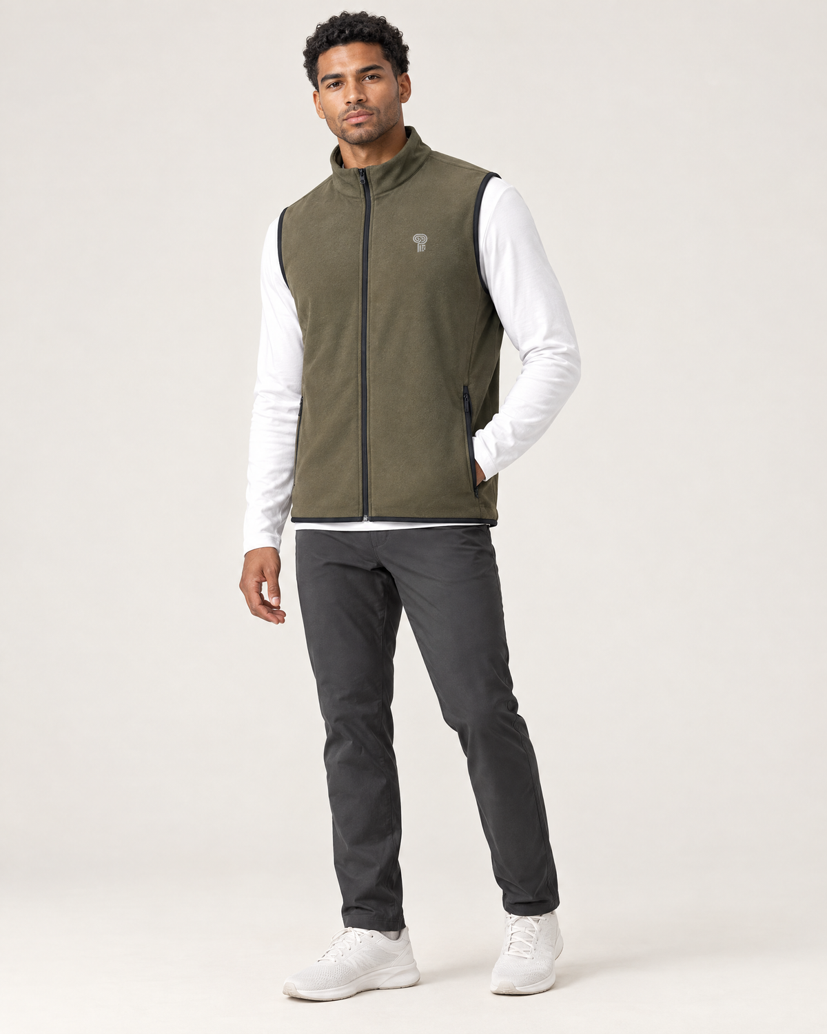 Polocom Plus Traverse Zip-Up Fleece Vest in Green, worn by an adult model with a small silver P emblem