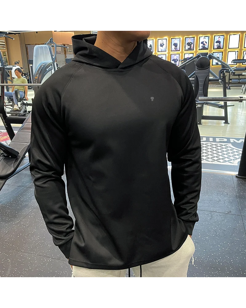 Polocom Plus Momentum Training Hoodie in Black, model front view
