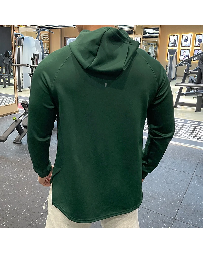 Momentum Training Hoodie in Green, model rear view