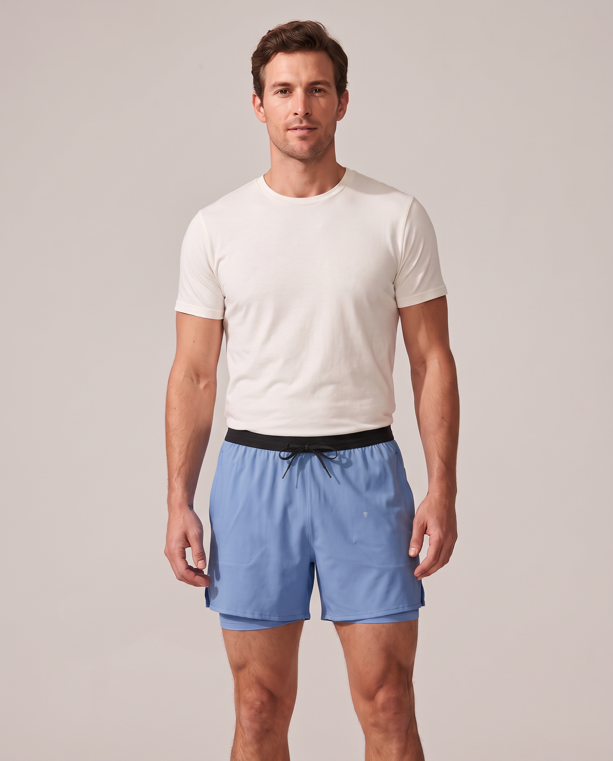 Polocom Plus Velocity running shorts in blue, front on model