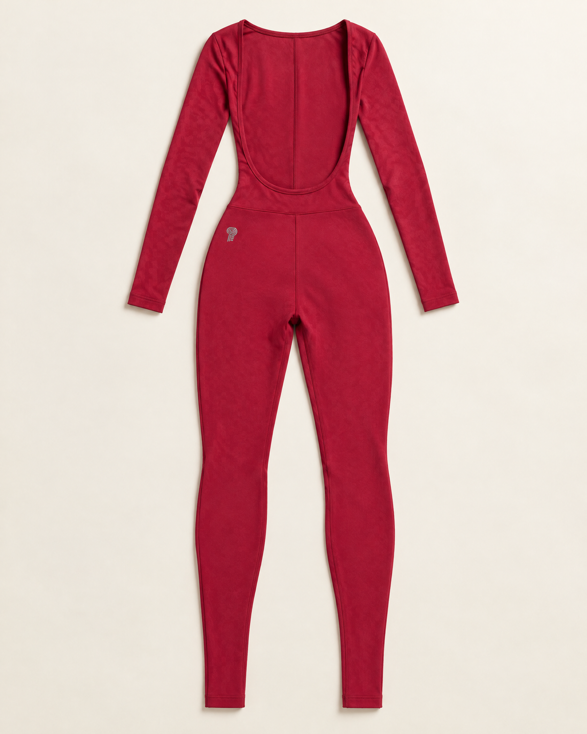 Polocom Plus Arc Open-Back Long-Sleeve Jumpsuit | Cherry Red | Garment detail view