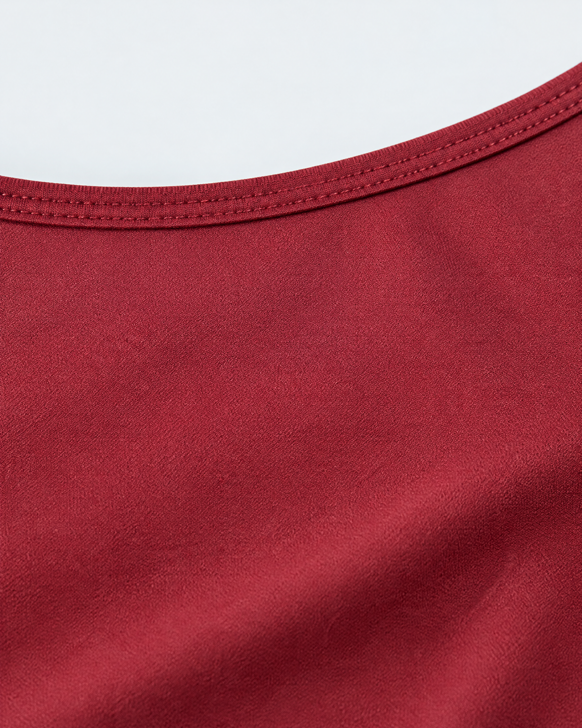 Arc Open-Back Long-Sleeve Romper | Cherry Red | Detail view