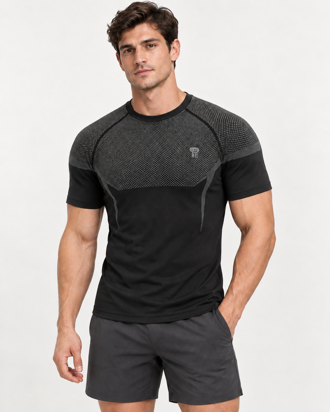 Polocom Plus Sculpt Panel Training Tee in Black gray, front model concept view