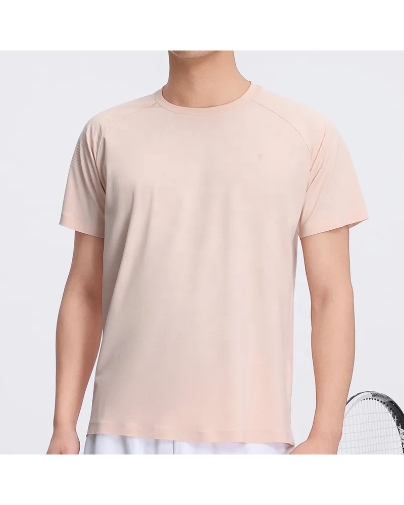 Polocom Plus Court Air Nylon Stretch Tee in Pale Orange, model view