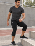 Polocom Plus Interval Three-Quarter Tights — standalone reflective silver emblem branding mockup, no lettering.