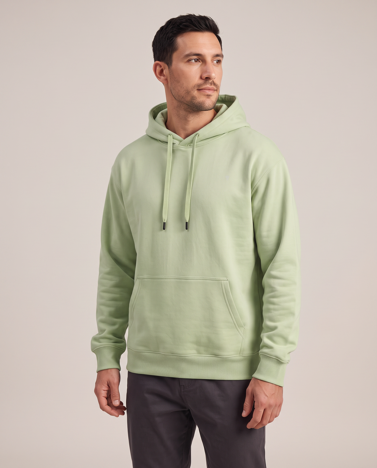 Polocom Plus Everyday hoodie in Green, close three-quarter front view with small silver emblem