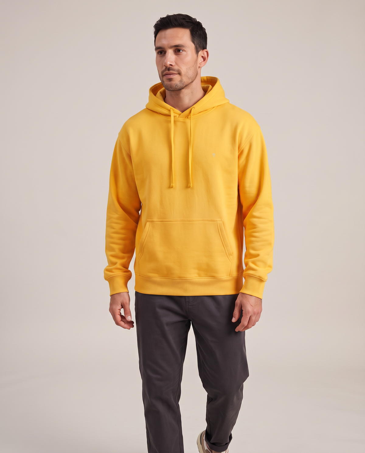 Polocom Plus Everyday hoodie in Yellow, front worn view with small silver emblem