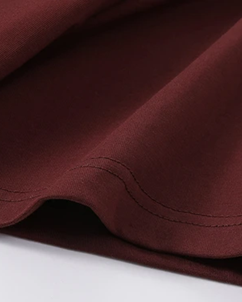 Form quarter-zip tee Red fabric and sleeve hem detail