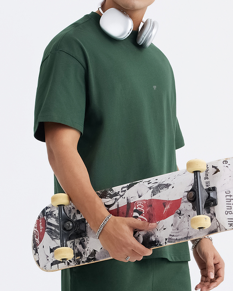 Polocom Plus Frame 275 Cotton Tee — Dark Green front on model