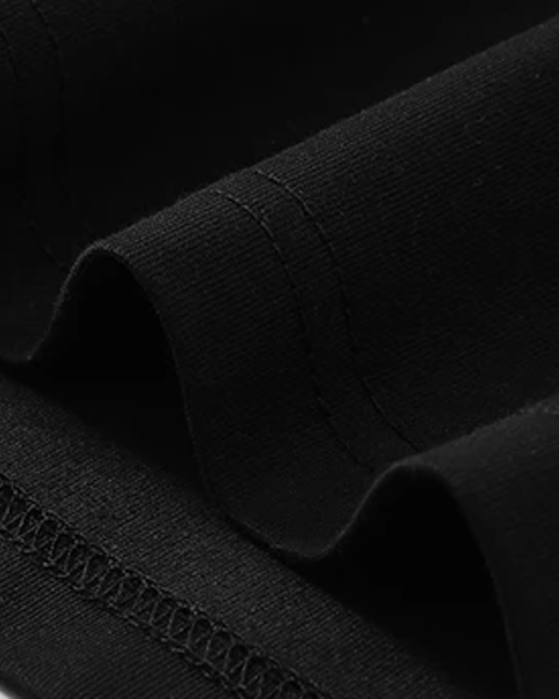Lane quarter-zip tee black knit fabric and hem detail