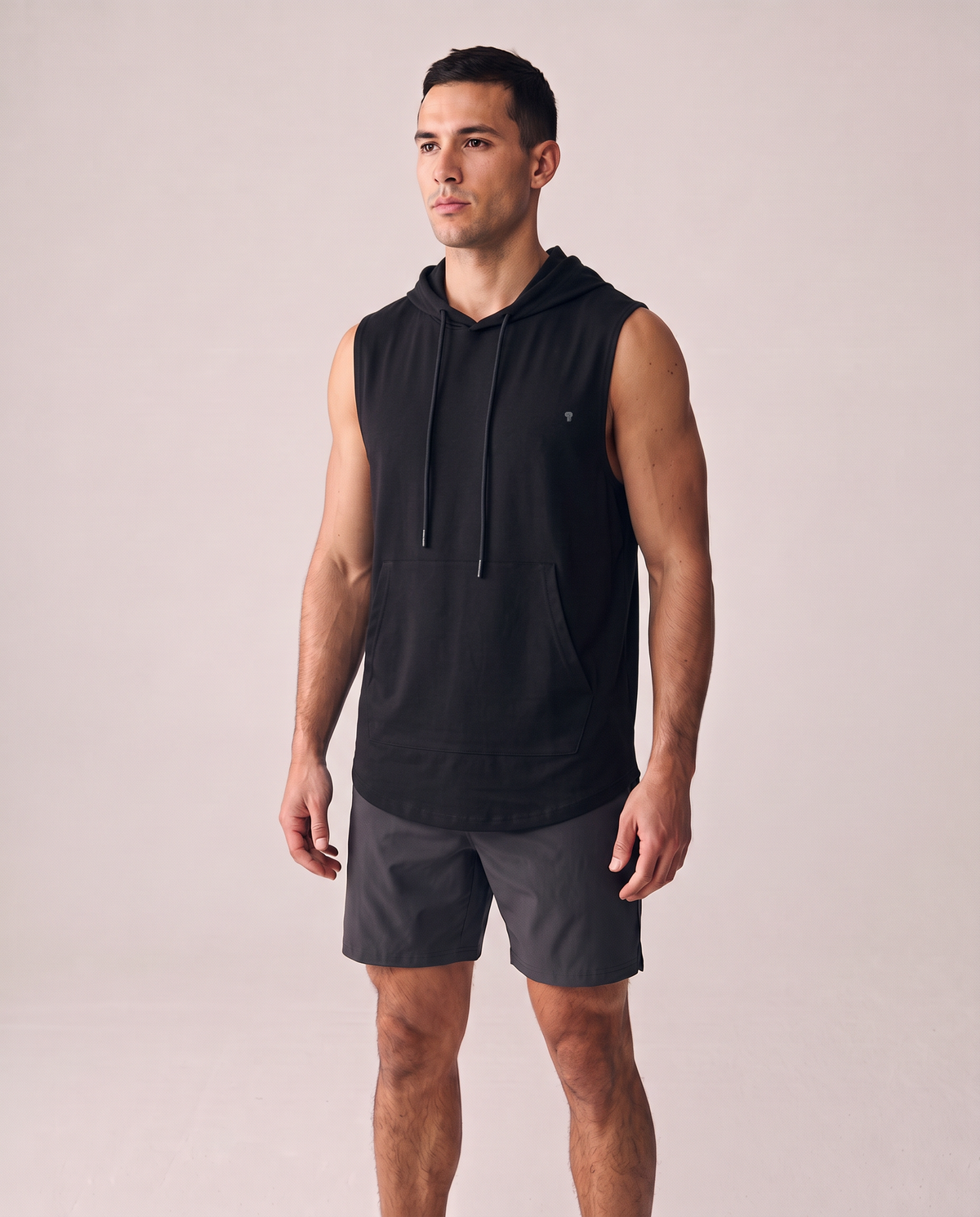 Polocom Plus Motion sleeveless hoodie in Black, front worn view with small silver emblem