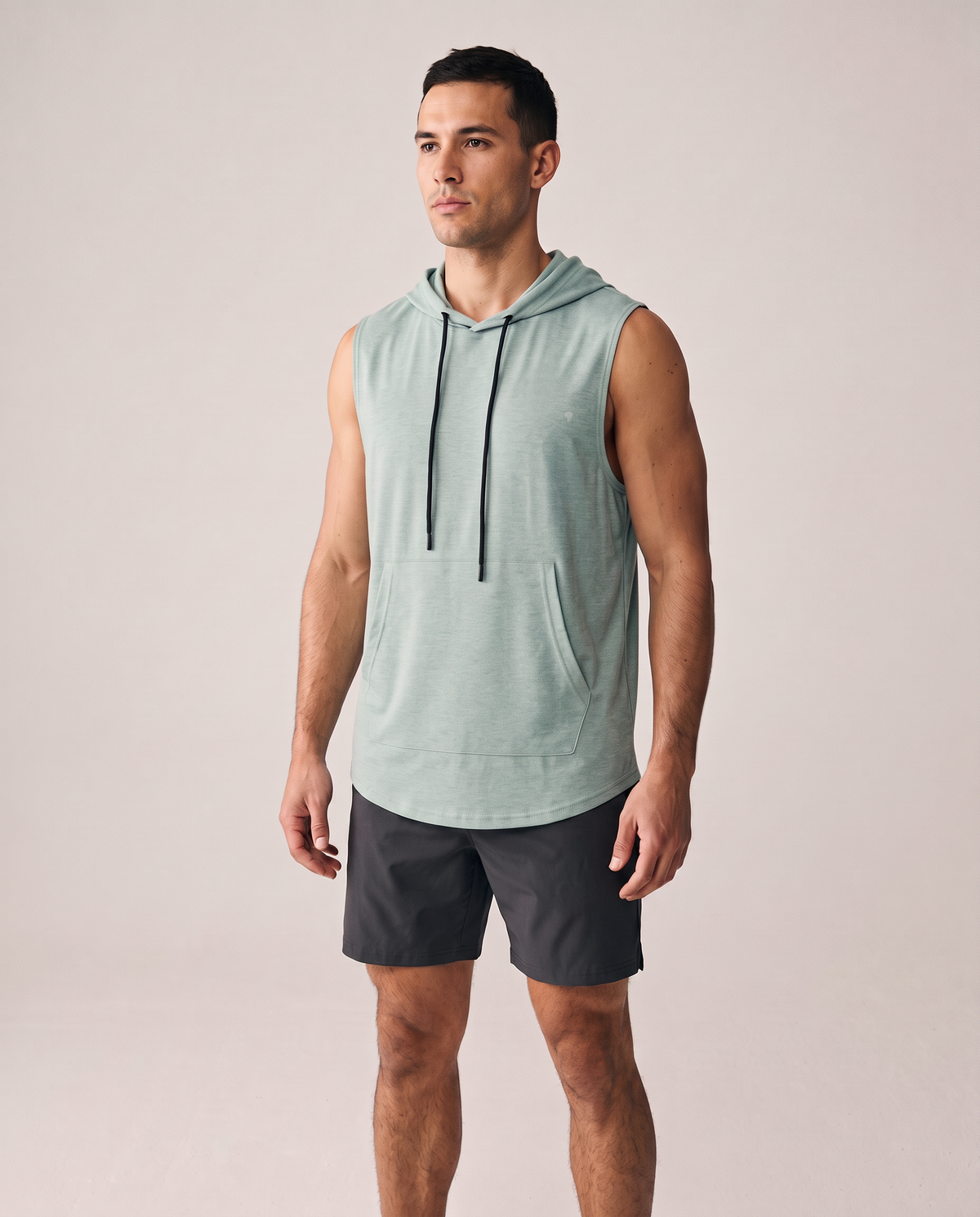 Polocom Plus Motion sleeveless hoodie in Green, front worn view with small silver emblem