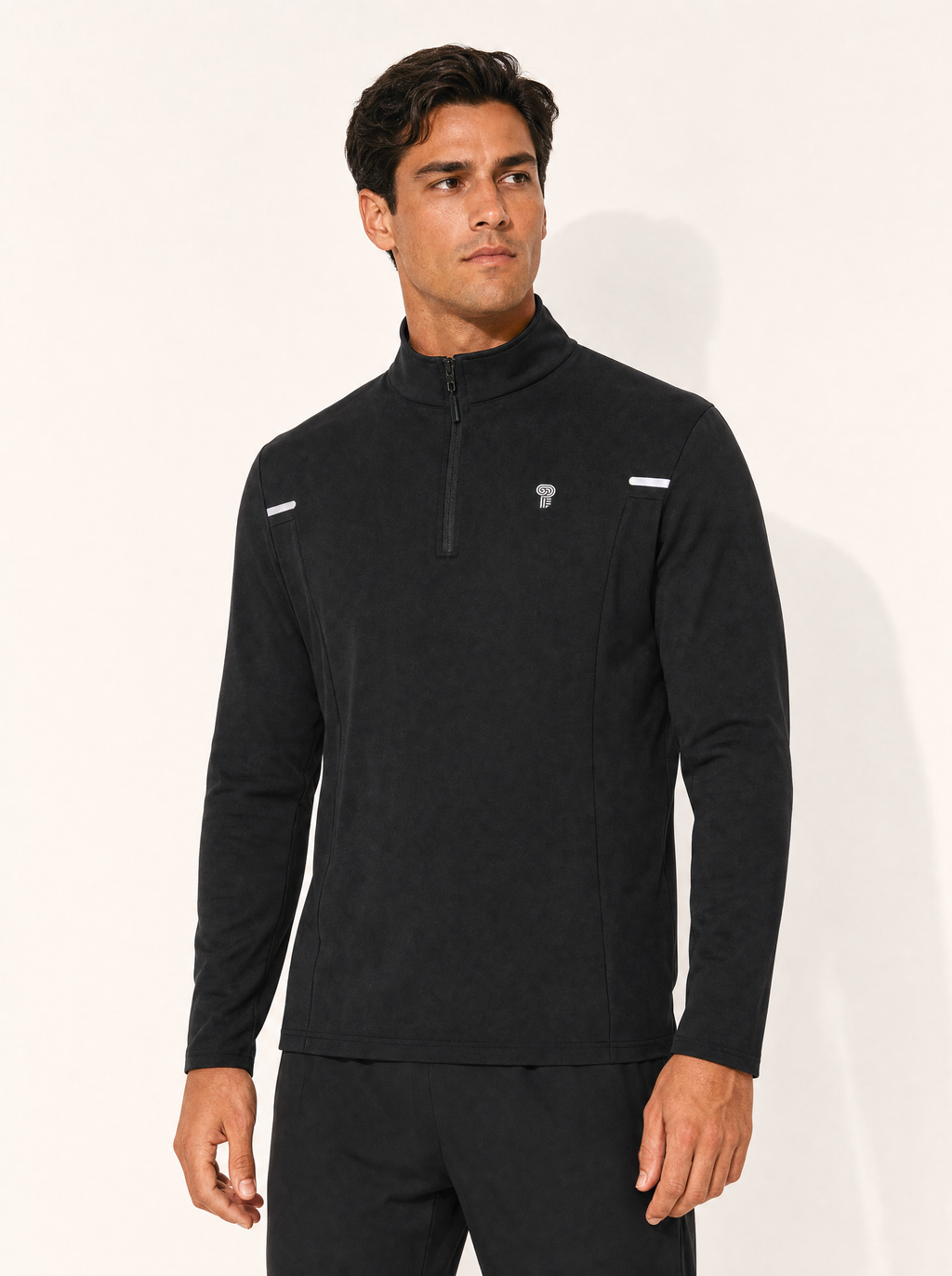 Polocom Plus Quarter-Zip Performance Pullover — Black shown on an adult model.