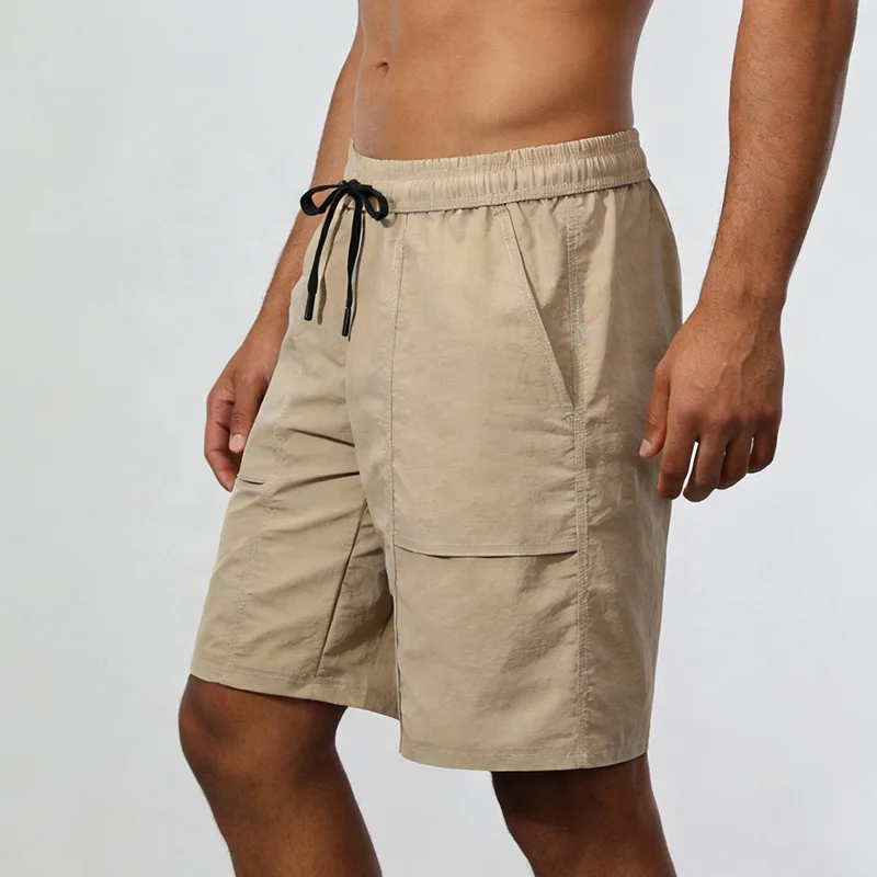 Polocom Plus Roam Nylon Shorts in Khaki, front view on an adult male model