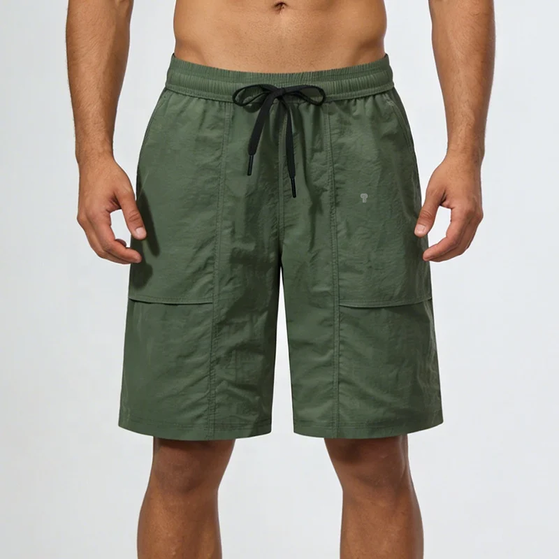 Polocom Plus Roam Nylon Shorts in Army Green, front view on an adult male model