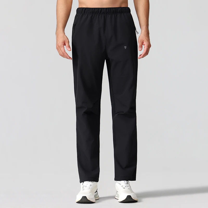 Polocom Plus Stride Straight-Leg Training Pants in Black, front view on an adult male model