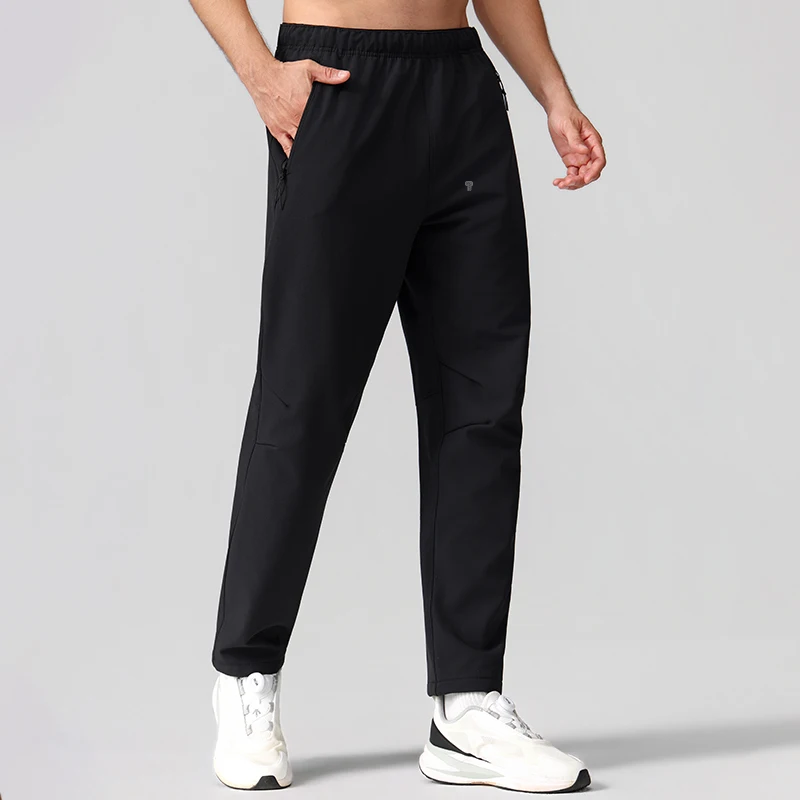 Polocom Plus Stride Straight-Leg Training Pants in Black, three-quarter view on an adult male model