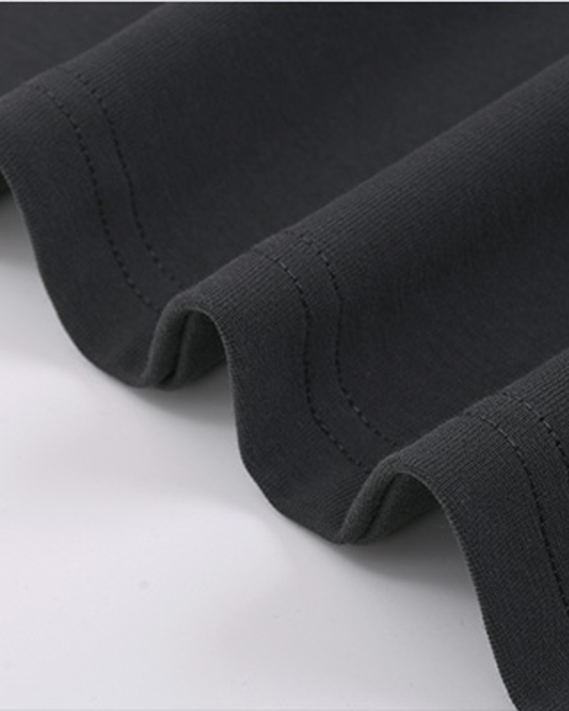 Studio Cotton Tee hem stitching detail