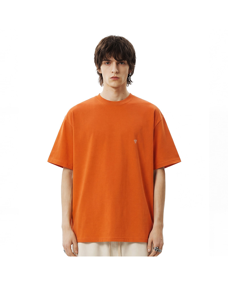 Polocom Plus Studio Cotton Tee in Orange, model front view
