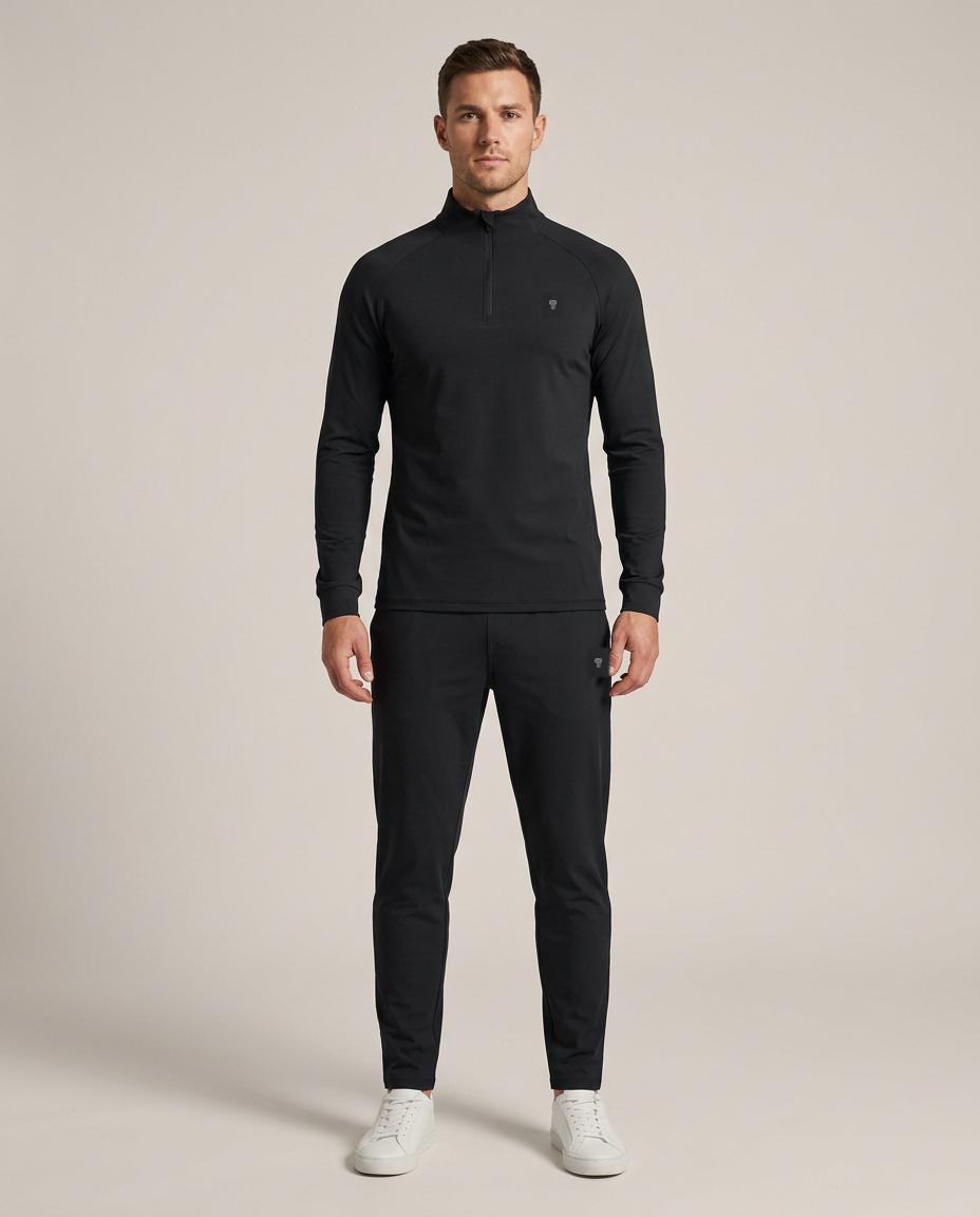 Polocom Plus Tempo Quarter-Zip Tracksuit in Black, front view worn by an adult male model