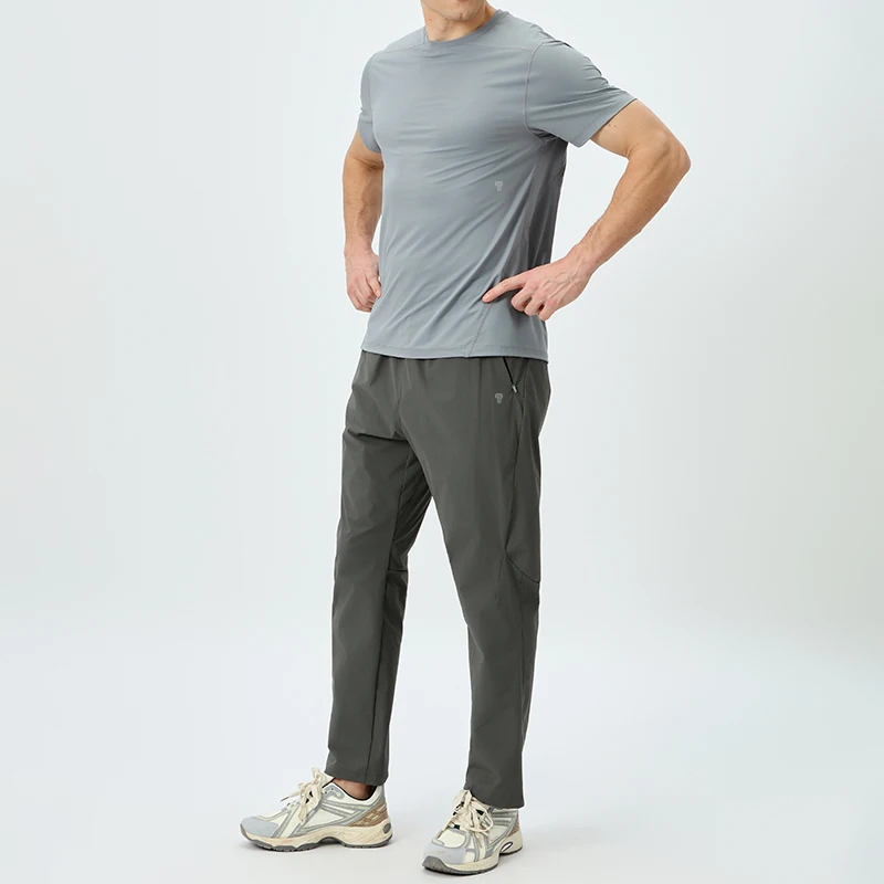 Polocom Plus Tempo Tee & Training Pants Set in Gray, front view worn by an adult male model